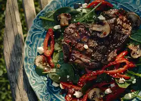 Grilled Ribeye with Spinach & Roasted Red Pepper Salad recipe