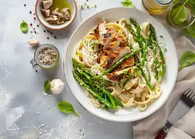 Fettuccine Alfredo with Smoked Chicken, Asparagus & Mixed Greens recipe