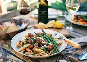 Penne with Spicy Sausage and Black Olives recipe