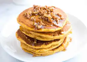 Fluffy Pumpkin Pancakes with Butter Pecan Syrup recipe