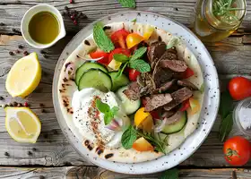 Spiced Beef Pita with Tomato-Cucumber Salad & Mint Yogurt recipe