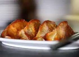 Pretzel Pork and Chive Dumplings With Tahini recipe