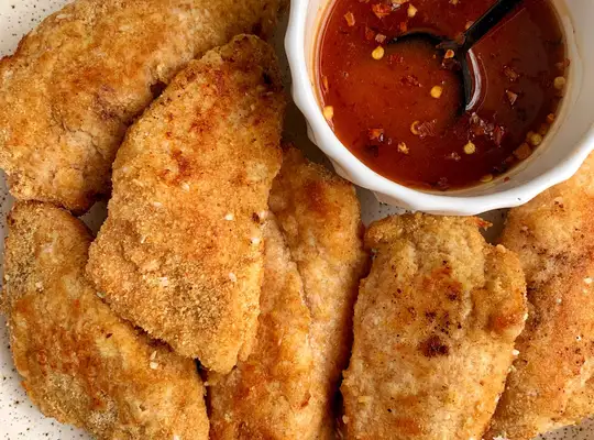 Stashcook | Paleo Crispy Sesame Chicken Tenders with Spicy Honey Sauce