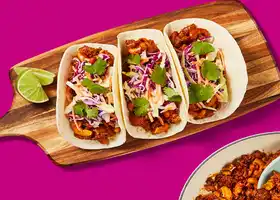 One-Pan Sweet & Spicy Cashew Pork Tacos with Gochujang Sauce & Tangy Slaw recipe