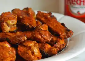 Grilled Chicken Wings with Seasoned Buffalo Sauce recipe