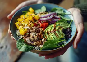 Spicy Pork and Quinoa Bowl with Spinach and Avocado Cream recipe