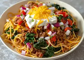 Cheesy Beef Taco Spaghetti with Spinach and Sour Cream recipe