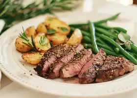 Herb-Crusted Steak with Garlic Roasted Potatoes & Green Beans recipe