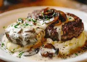 Beef Patties with Creamy Mushroom Sauce & Herb Mashed Potatoes recipe