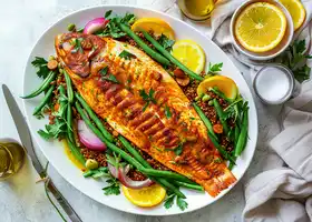 Oven-Baked Turmeric Tilapia with Green Beans & Spicy Sausage Sauce recipe